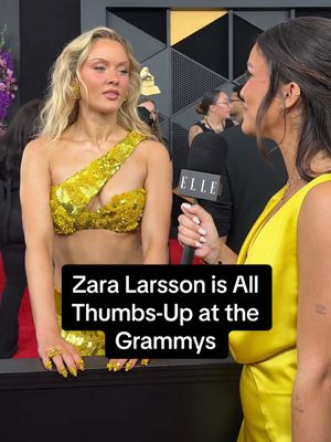 She's a first-time #Grammy nominee! @Zara Larsson is all thumbs-up as she talks about ‘Midnight Sun’ and going viral with @Jessica Judith on the red carpet.