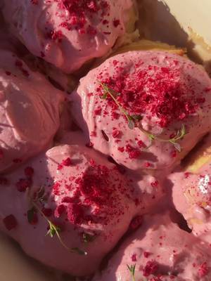 Soft and fluffy raspberry almond rolls Ingredients 🍓Dough  100ml warm milk 1 teaspoon dry yeast 1 tablespoon sugar 30 gr soft butter 1 egg 260 gr flour 50 gr sugar pinch of salt a splash of heavy cream for baking 🍓Almond frangipane 3 tablespoon soft butter 50 gr sugar pinch of salt 48 gr almond flour 12 gr all purpose flour 1 egg 1 teaspoons almond extract 1/2 teaspoon vanilla extract 🍓Filling raspberry jam a handful of fresh raspberries, halved 🍓Raspberry cream cheese frosting: 1 block room temp cream cheese (8oz) 226 gr soft butter 300 gr powder sugar pinch of salt 159 gr raspberry jam 1/2 teaspoon vanilla extract Instructions For the dough, warm milk up to about 100-110F but no higher and pour into the bowl of a stand mixer. In the same bowl, add yeast & 1 tbsp sugar. Stir to dissolve and let sit for 10 minutes to activate. When the yeast is foamy and bubbly, add egg and butter. Whisk until everything is incorporated. Then add in the flour and remaining sugar. With the dough attachment, mix dough on medium speed for 10-15 minutes. Once the dough is smooth and springs back when you poke it with a finger, it is ready. Transfer dough to a clean, greased bowl (I used baking spray). Cover and let rise for about 1.5 hour, or until it has doubled in size. In the meantime, prepare the almond frangipane. In a bowl, beat together softened butter and sugar until light and fluffy. Stir in flour, salt, egg, and flavor extracts. Mix until combined. Cover and set aside After the dough is proofed, punch it to release air and turn it onto a lightly floured surface. Roll it out to 1/4 inch thickness Spread a layer of almond frangipane all over the dough. Then a thin layer of jam and sprinkle fresh raspberries on top Roll dough tightly into a log. Cut into 6 equal rolls Place the rolls into a lightly greased baking pan, pour a splash of heavy cream over the dough, cover and let rise for 30 minutes. Preheat the oven to 375F. Bake the rolls for about 15-20 minutes, until the top is golden brown. While the rolls are baking and cooling, make the frosting. In a bowl, beat together cream cheese, butter, salt, and vanilla until aerated and well combined. Add powdered sugar and beat on low until incorporated then increase speed to medium & beat for another minute. Add jam and beat to combine Once the rolls have been cooled for about 15 minutes, spread the frosting on them. Optional: sprinkle with crushed up freeze dried raspberries. Serve and enjoy #homebaking #bakingrecipe #cinnamonroll valentines baking inspo, pink pastries, pink baking, galentines