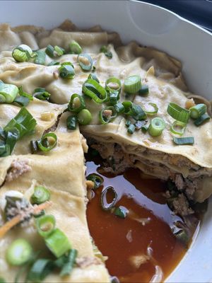 Can you still cook dinner for your family of 4 for $20?  If you shop at ALDI  you can.  And it’s delicious!  This is my “dumpling lasagna” hack and it’s the easiest $20 dinner for 4. It tastes like dumplings, but you build it like a lasagna, then serve it with a quick pickled cucumber salad for crunch. Save it for the tight budget weeks that you still want to eat delicious food! Dumpling lasagna + pickled cucumber salad (serves 4) What you NEED Fresh lasagna sheets $3.69 500g Pork mince $4.49 250g Coleslaw mix $1.99 1 bunch Green onion $2.49 1/2 cup Soy sauce $1.79 4 tbsp Oyster sauce $2.19 1 Cucumber $1.29 2 tbsp Crushed ginger  (already in the fridge) 1 tbsp minced garlic (already in the fridge) What you do 	1.	In a big bowl, mix pork mince, coleslaw mix and sliced green onion. 	2.	Add garlic, ginger, a 1/4 cup soy sauce and oyster sauce. Plus a dash of white pepper if you have it. Mix really well. 	3.	Drizzle a little oil and a cup of water in a large saucepan,  then lay down fresh lasagna sheets. 	4.	Add a layer of the mince mixture, then repeat sheets and filling until it’s all used up. 	5.	Mix another cup of water with an extra splash of soy, then pour it over the top so the sheets cook properly. 	 	6.	cover with a layer of baking paper, then pop the lid on. 	7. Cook on medium for about 35 to 40 minutes, until cooked through. Add another cup of water over the top halfway through. Pickled cucumber salad 	1.	Thinly slice cucumber (I used a mandolin), then toss with sliced green onion. 	2.	Add a splash of soy sauce and 1/2 tsp of crushed ginger and let it sit while the lasagna cooks. #australiaaldi #aldi #easydinner #stephcooksstuff #EasyRecipe 