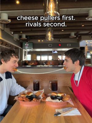 Different teams same cheese pulls. ​#tripledipper #cheesepull #heatedrivalry #chilis 