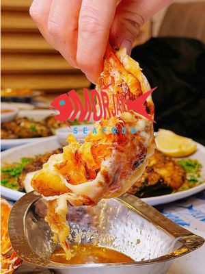 🌊✨ **MORJAN SEAFOOD: YOUR NEW MEDITERRANEAN OBSESSION** ✨🌊 📍Morjan Seafood 📍 25-40 Steinway St, Long Island City, NY 11103 From the owner of Zyara - New York Mayor Zohran Mamdani's FAVORITE restaurant and crowned Best Shawarma & Best Halal Mediterranean in Astoria Queens👑 - comes his brand-new venture literally across the street:  Morjan Seafood Named after the Arabic word for "coral" or "small pearl" 🐚, this Mediterranean seafood gem is about to become **THE** go-to spot for Halal Mediterranean seafood in Queens 🔥 ⚡ GO NOW before they blow up!! They're SO new they're not even on Google Maps yet 📍 But trust me, once word gets out about this place, you'll be waiting in LINE 🚶‍♀️🚶‍♂️ Walk into their **super clean interior** and prepare to be MESMERIZED by the MASSIVE display counter showcasing FRESH seafood on ice beds 🧊🦞 Open kitchen? Check ✅ Flame grills? Check ✅ Pick your catch and tell the chef how you want it - fried, grilled, baked - ANYTHING GOES!  Now let's talk FOOD 🤤: 🐟 Grilled RED SNAPPER- perfectly charred, flaky perfection 🐟 Grilled BRANZINI- delicate, buttery, melt-in-your-mouth 🍣 Blackened SALMON- smoky crust, tender pink center 🦪 Butter seared SCALLOPS- rich, caramelized sweetness 🦞 Cheese baked LOBSTER- decadent, gooey indulgence 🦑 Fried CALAMARI- crispy golden rings of heaven 🐠 SARDINES with olive oil- briny, Mediterranean simplicity 🦐 Garlic COLOSSAL SHRIMP- plump, aromatic, flavor-PACKED Those authentic, exotic Arabic seasonings & dips🌶️✨ We're talking TANGY, SPICY, LAYERED flavors you literally can't find anywhere else!  #MorjanSeafood #AstoriaEats #HalalSeafood 🦞🔥