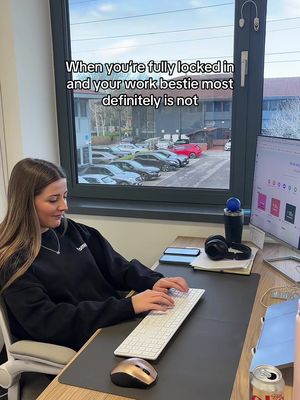 One of us is focused.  One of us is social.  #OfficeLife #SocialMediaMarketing #CreativeAgency #WorkBesties #OfficeHumour 