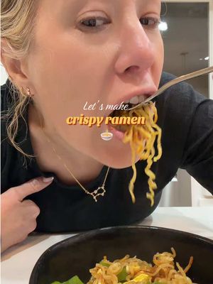 How to make crispy Ramen 🍜: Ingredients: 2 packets of ramen with seasoning 2 tbsp butter 2 tsp olive oil 1 tsp sesame oil 1 tbsp soy sauce 1 tbsp onion powder Optional sautéed onions, 2 eggs, and green onions - boil water with 2 tbsp of butter - cook ramen in medium skillet with water to about half way up the ramen - Add sesame oil, onion powder, sautéed onion, 1 ramen seasoning packet, & soy sauce - cook until all liquid is absorbed & then add olive oil, pepper, any other ingredients to taste - add eggs or meat if desired - cover and let ramen fry until golden brown - as much or as little fry as desired - serve with green onion  I hope you love it just as much as we did!  #crispyramen #ramenrecipe #easyramen #cookingwithmichellesays 