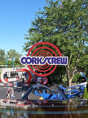 It's time to wish a very #HappyBirthday to this 50-year-old! 🎂🎁🎊🎉🥳 #Corkscrew debuted to the world in 1976. This record-breaker’s a heartbreaker. You can’t miss its iconic blue track and white supports as you walk under it in the middle of the midway. Red trains create the all-American color scheme inspired by the U.S. Bicentennial in 1976, the year the ride opened. Looking through the eye of the inversions that gives it its name can give you a taste of the teeth-clenching courage needed to ride. Corkscrew was the first coaster in the world that featured three inversions and it hasn’t looked back since. Strap in and brace yourself, because this steel track shows no mercy. It’ll turn you up, down, around, inside out and back again. After that first loop, it’ll take your nerves of steel and push them to the limit. Gravity has no bounds as you flip upside down going 48 m.p.h. and make eye contact with the park-goers below. Once you’re in, you’ll never look at Cedar Point’s midway the same again. #arrow #rollercoaster