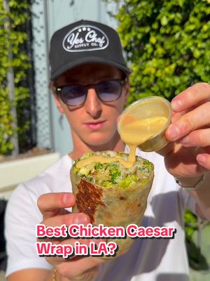 Trying what people say is the best new chicken caesar wrap in LA! 📍Fairgrounds, LA  #LA #lafood #chickencaesarwrap 