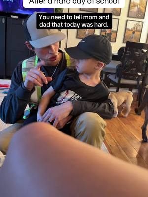 Hearing dad signs with Deaf son after a hard day #cochlearimplant #signlanguage #deaf #asl #parenting 
