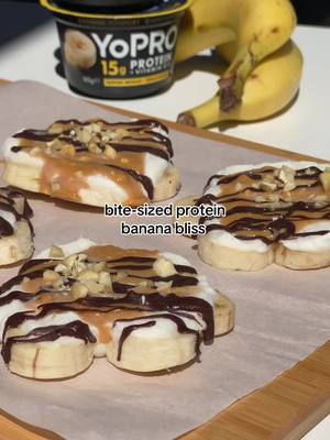 frozen banana yoghurt clusters, protein edition 🍌 ingredients (makes 4 frozen clusters): 2 large bananas, sliced 1 pot banana YoPRO yoghurt 4 tsp peanut or almond butter 4 tsp sugar-free dark chocolate, melted 4 tsp peanuts, crushed method: 1. layer banana onto baking paper in small clusters. 2. top with banana YoPRO yoghurt, almond/peanut butter, drizzle of sugar-free dark chocolate and sprinkle of peanuts. 3. freeze for 2 hours, or until solid #YoPRO #BananaYoghurtCluster #YoghurtClusters #BananaCluster #BananaDessert 