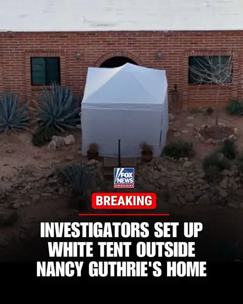 BREAKING: Investigators put up white tent outside entrance to Nancy Guthrie home.
