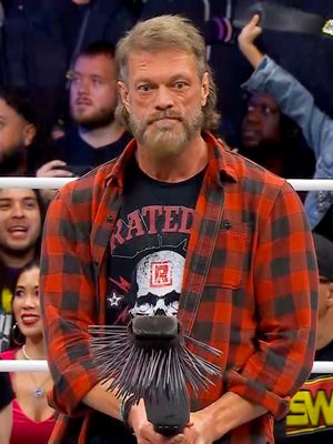 #OnThisDay in 2025: Adam Copeland tried to free the AEW World Title from the Death Rider's briefcase, but Jon Moxley wasn't having it! 😤