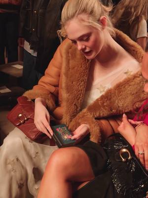New hyperfixation: reading out of a book charm 📚 #CoachFall26 #CoachNY #NYFW #BookTok