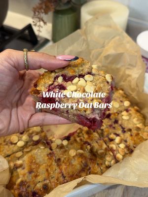 BATCHCOOK WHITE CHOCOLATE RASPBERRY OAT BARS These are so good! Easy to prep for breakfasts during the week.  For 6 portions:  - 200g oats - 200g greek yoghurt - 50g vanilla protein powder  - 250ml milk - 1tsp baking powder  - 50g white chocolate hazelnut spread - 100g frozen raspberries   - 1 scoop @MORE chunky flavouring  Toppings:  - 40g white chocolate chips   Add the yogurt and chocolate spread to a large bowl and mix until smooth. Stir in the oats, protein powder, baking powder and chunky raspberry more flavour, making sure everything is well combined. Gradually add the milk, stirring until you have a thick but pourable oat mixture. Lightly grease an ovenproof baking dish or line it with greaseproof paper. Pour the mixture into the dish and spread it out evenly. Sprinkle the white chocolate chips over the top. Bake in a preheated oven at 180°C for 20–25 minutes, until set and lightly golden. Remove from the oven and allow to cool slightly before cutting into 6 even squares. These can be eaten hot or cold. To serve warm, reheat and enjoy with a dollop of fat-free yogurt. Store in an airtight container and consume within 4–5 days. • #bakedoats #breakfastbar #fyp #breakfastideas #mealprep      
