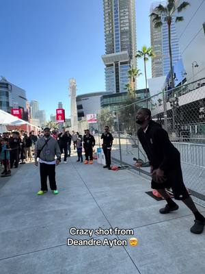 Deandre Ayton nailed this crazy shot at the @Crocs space at the Foot Locker Takeover experience at #AllStarWeekend 🤯