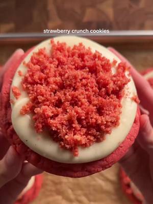 Strawberry Crunch Cookies cookie: 1 1/2 cups (190g) ap flour 1/2 tsp (2g) baking powder 1/2 tsp (3g) baking soda 1/2 tsp (3g) salt 1 tsp (3g) beet powder or red food coloring 1/2 cup (113g) unsalted butter melted 1/2 cup (100g) light brown sugar 1/4 cup (50g) white sugar 1 egg + 1 egg yolk 1 tsp (4g) vanilla 1/2 cup (13g) freeze dried strawberries 1/2 cup (85g) white chocolate chips *melt butter and mix in the sugars well. add in eggs and vanilla. in another bowl, whisk together the baking powder, baking soda, salt, and beet powder or food dye. add the dry into the wet and mix gently. then add in the freeze dried strawberries and white chocolate chips. scoop onto baking sheet and set in the fridge about an hour. bake at 350 for 11-13 min. frosting: 8 oz (226g) cream cheese, soft 4 tbsp (57g) unsalted butter, soft 1/2 tsp (2g) vanilla (paste if available) pinch of salt ~4 cups (~480g) powdered sugar 2–4 tbsp milk, to thin if needed cream together the cream cheese and butter until smooth and fluffy. add in vanilla and salt. slowly mix in the powdered sugar and thin with milk if needed. let cookies cool before frosting strawberry crunch 10-12 golden oreos 1/4 cup (6-7g) freeze dried strawberries 1/3 box (35-40g) of strawberry jello mix 2 tbsp unsalted butter, melted *crush oreos into fine crumbs. crush freeze dried strawberries until its almost a powder. combine both in a bowl and add in the jello powder and melted butter. mix well. sprinkle on top of frosted cookies #lemon8 #strawberry #cookies #Recipe