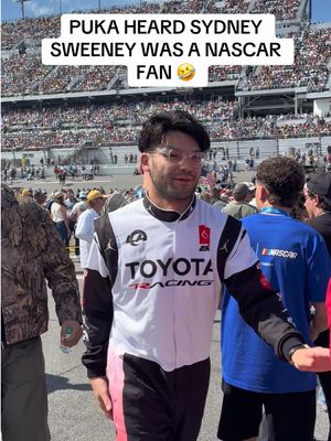 Puka Nacua out here doing side quests for Sydney Sweeney #daytona500 #pukanacua #nascar #nfl #sydneysweeney 