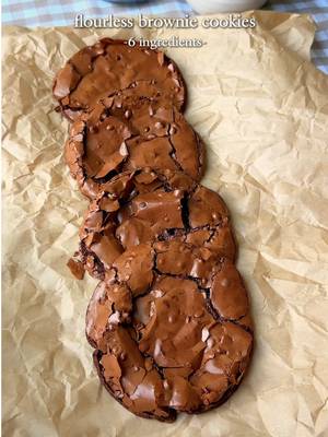 choco brownie cookies ~  if a brownie and a cookie had a love child, it would be these flourless chocolate brownie cookies 🤎 this recipe only needs 6 key ingredients for a deliciously chewy and fudgy cookie!  for everyone asking, the app link for Osta is in my bio, or search “Osta Recipes” in the app store or google play store!!  comment “brownie cookie” for a direct link to the recipe!  ingredients -350 g powdered sugar -65 g cocoa powder (about 10 tablespoons; using a scale is best since cocoa powders vary in weight) -1/2 tsp salt -3 egg whites (about 1/2 cup liquid egg whites) -1/2 cup semi-sweet chocolate chips (optional but recommended) -1 tsp instant coffee -1 tsp vanilla bean paste (optional, but recommended) instructions: preheat oven to 350°f (175°c). line a baking sheet with parchment paper and lightly butter it to prevent sticking. in a large bowl, combine powdered sugar, cocoa powder, salt, egg whites, instant coffee, and vanilla bean paste. stir until a thick, glossy batter forms. fold in the chocolate chips, if using. if your dough is super runny, refrigerate for 30-60 mins before baking!  scoop 2–3 tablespoons of batter per cookie onto the prepared baking sheet. leave 4–5 inches between each cookie, as they spread quite a bit. four cookies per sheet will prevent spreading into each other, but you can fit six if you don’t mind some overlap. place the baking sheet on the middle rack of the oven. bake for 8–10 minutes, or until the tops begin to crack. -8 minutes = very fudgy centers -closer to 10 minutes = less fudgy -ovens vary, so bake in 1-minute increments if needed. do not exceed 10 minutes. immediately after baking, use a round bowl to gently swirl around each cookie to shape and round them. this helps “fluff” the edges, which can look flat straight from the oven. remove cookies from the baking sheet right after shaping so they don’t continue cooking on the hot tray. transfer to a cooling rack and let cool completely before eating. enjoy 🤎