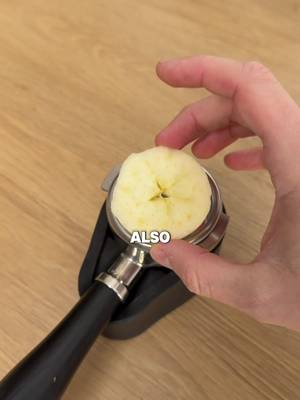 Pulling a shot of espresso through an apple slice 