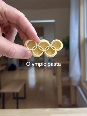 How to Make Chicken & Pasta Milanese 🇮🇹🥇ft. @Olympics pasta noodles  FULL RECIPE BELOW ⬇️ (feeds 2 people) INGREDIENTS: 1 large boneless, skinless chicken breast 1/2 cup AP flour 1/2 cup fine Italian breadcrumbs  2 large eggs 1 cup light olive oil  1 tbsp extra virgin olive oil 200g pasta of your choice 1 large shallot 3 cloves garlic 1/3 container saffron 1/4 cup hot water 100 mL white wine 200 mL chicken stock 1/4 lb butter, diced 1 piece Parmesan cheese (to grate fresh) 1/4 bunch parsley Fine sea/kosher salt (to taste) Freshly cracked black pepper (to taste) INSTRUCTIONS: CHICKEN MILANESE: 1. Cut your chicken breast in half lengthwise, and pound out both pieces between two pieces of parchment until they’re 1/2 cm thick. Season the cutlets with salt.  2. Set up three trays, one each with flour, beaten eggs, and breadcrumbs. Bread each cutlet, going flour, then into the egg, then into the breadcrumbs, getting a good dredge on each step, but also shaking off any excess before moving to the next tray.  3. Pre-heat your 1 cup of light olive oil in a medium heavy-bottom pan over medium-high heat. You want the oil to reach 180C/350F before adding your cutlets. Immediately turn the heat on your pan down to medium once the cutlets hit the oil, and continue to shallow fry for 3-4 minutes, flipping your cutlets often to ensure even colouration. Once your cutlets are golden brown, and have reached an internal temperature of 72C/162F, remove them from the pan and season them with a pinch of salt + pepper. 4. Garnish your chicken with some chopped parsley and freshly grated parmesan cheese. PASTA ALLA MILANESE: 1. Bring a pot of heavily-salted water to a boil. Finely chop your shallots and garlic. Finely grind your saffron and bloom it by pouring 1/4 cup of hot water over the saffron and letting it steep. Drop your pasta in your boiling water, and allow it to cook until al dente.  2. In a separate pan, sauté your shallots and garlic in 1 tbsp EVOO until translucent. Add your white wine, and let it reduce until a syrupy consistency. Add your saffron/hot water mix, and your chicken stock. Reduce the liquid in the pan by half. Turn the heat to low, and start emulsifying in your cold butter, 3-4 cubes at a time. I find a whisk is helpful with this step. Keep adding butter until your sauce can coat the back of a spoon.  3. Add your pasta to the sauce, along with a generous grating of Parmesan. Also add a small ladle of your pasta water to help bring the sauce together. Stir and toss your pasta as the sauce reduces once more. You can finish your pasta with chopped parsley if you’d like, or serve it as-is! Enjoy! #olympic #rings #pasta #homecooking #Recipe 