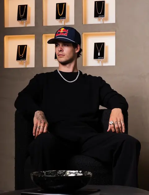 Professional motocross rider & 10-time champion Jett Lawrence takes his style seriously. That’s why he wears our Iced Out Cuban Link Chain 10mm. #jaxxon #jewelry #gold #silver #champion 