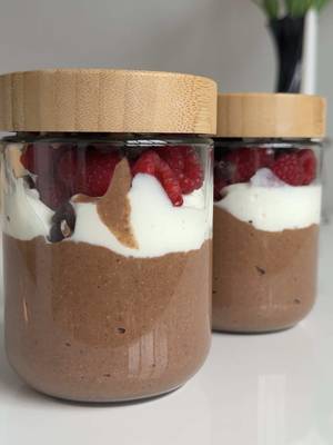 Chocolate blended chia pudding >>>>  Ingredients 1/2 cup chia seeds 2 scoops chocolate protein powder  2 tbsp chocolate pb fit  1 tbsp unsweetened cocoa powder 1 1/2 cups unsweetened vanilla almond milk maple syrup (or any sweetener of choice) Toppings: yogurt and raspberries Instructions: 1. Add all ingredients to a high speed blender, blend until it starts to thicken into a pudding like texture. This may take some time! 2 Evenly distribute amongst 3 glass jars then top with yogurt and raspberries, store in the fridge for up to 4 days.  #healthyrecipes #highprotein #mealprep #chiaseed #healthybreakfast 