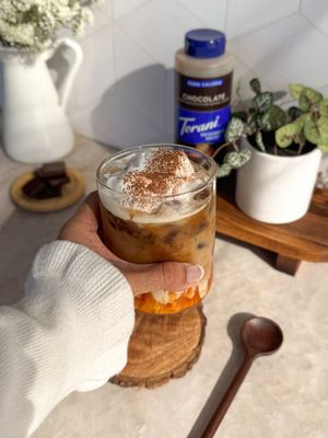 earl grey mocha made with @Torani Zero Calorie Chocolate Beverage Sauce! a silky smooth chocolate sauce that adds indulgence minus the calories✨it complements the fragrant earl grey flavor perfectly #ZeroCalorieCart #ad  🛒 shop now in stores at a Walmart near you!  🍫 steep 2 tsp earl grey tea leaves in 1 cup milk for at least 4 hours or overnight; strain the tea leaves  🍫 add ice and 2 tbsp Torani Zero CalorieChocolate Beverage Sauce to a glass   🍫 pour the earl grey steeped milk in  🍫 add 2 shots of espresso  🍫 top with whipped cream and cocoa powder 