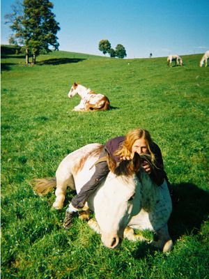 “When I was a child, I always felt most comfortable with animals. I knew it very early. I even looked into working at an animal rescue center, but everyone told me not to. They said there was no money in it, and I should do something more practical. So I decided to work in nursing, and then as social worker. I was born here in Kandersteg, but moved to the city for my studies and my job. I learned a lot there, and I don't regret it. But deep down, I always knew I would find my way back to the countryside.  When my father died, it became clear that Kantersteg was where I needed to be, so I moved back home. It was around Covid, and I had the opportunity to rent a farm. I had one dog at the time. Then I bought a second dog, then two horses, some chickens, ducks, and later even peacocks. Slowly, my life started to revolve around animals again. When I'm outside, in nature, with my animals, I can truly be myself. Many people forget this feeling, and you don't need to change your whole life to find it; sometimes you just need to put away your phone, grab the dirt, go somewhere green, smell the flowers and remember who you are, not who the world wants you to be.” — Samira Kandersteg, Switzerland  Life on Film #lifeonfilm 