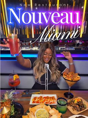 Nouveau Miami is my new favorite spot!🔥🔥🔥☀️ *must-try dinner experience* Nouveau Miami just opened in Wynwood and it’s giving upscale dinner meets nightlife energy. Already one of my Atlanta favorites, but Miami took it up a notch. Luxe ambiance, dramatic lighting, and a true opulent dining experience. Drinks: Berry Patch, Slip and Slide, Nouveau on Main. Food: Island Stir Fry, Ultimate Cajun Seafood Grits, Surf and Turf, Chicken Deviled Eggs. The staff recommendations were spot on and the flavors exceeded expectations. If you’re looking for a new fine dining restaurant in Miami, add Nouveau to your list. 🍸✨ . . . #miami #newrestaurant #nouveau #wynwood #miamifood 
