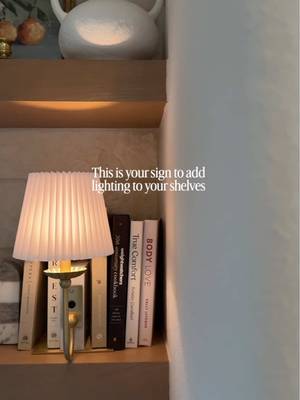 This rechargeable shelf lamp completely transformed my bookshelf styling — no cords, no drilling, no electrician. Just the easiest way to add warm ambient lighting and make built-in shelves look expensive. If you’re decorating a dark corner, styling bookshelves, or looking for renter-friendly lighting ideas… this is it. See anything you love? I have all of it linked on my LTK! Just search for my name “homewithcarolina_” Direct URL - https://www.shopltk.com/explore/Homewithcarolina_/posts/ae009674-1013-11f1-90cb-0242ac11000c #bookshelfstyling #homedecorideas #shelflighting #cozyhomevibes #renterfriendlydecor amazonhomefinds ltkhome interiorstyling modernhomeinspo texashomes shelfdecor