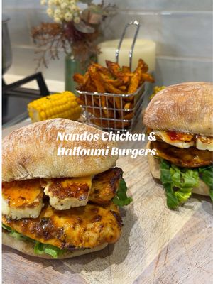 NANDOS CHICKEN & HALLOUMI BURGER  Follow @kimberlys_journeyy for more recipes like this⤵️ For the chicken:  - 300g chicken breasts  - 2tbsp peri peri marinade  - 1tbsp chicken seasoning  - 2tbsp Peri peri sauce  For the burgers: - 2 ciabatta rolls  - 15g garlic butter  - 50g reduced fat halloumi  - 2tbsp chilli jam - 2tbsp perinaise  - Lettuce gem  - Red onion  Butterfly the chicken breast, add your marinade and then I cooked mine in m air fryer under the grill setting!  When the chicken is almost cooked, fry or grill your Halloumi until golden.  For the rolls, spread over the garlic butter and then toast. Assemble the burgers with some chilli jam, lettuce, red onion and Nandos perinaise.  We had ours with chips cooked in the air fryer and some corn on the cobs  Making meals like this really help me keep on track over the weekend! • • • #fyp #mealplanning #chickensandwhich #nandosburgers #EasyRecipes 