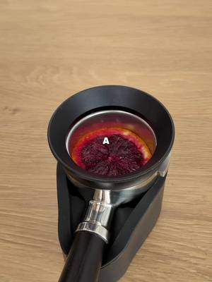 Pulling a shot of espresso through a raspberry orange 