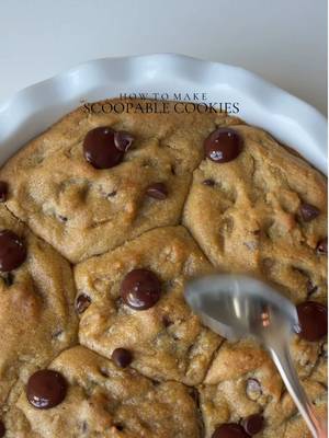 Scoop-able cookies 🍪  Ingredients  2 1/4 (285g) cups all purpose flour  1/4 tsp baking soda 1/2 tsp baking powder  1 tbsp corn starch  1 cup (200g) dark brown sugar  3 tbsp (37g) granulated sugar  1 egg + 1 egg yolk, cold 1 cup (225g) unsalted butter, cold  1 tbsp vanilla bean paste 1 cup (250g) semi sweet chocolate chips  6 tbsp nutella  Pinch of salt 1/2 tsp espresso powder coffee  Method: Line a small plate with parchment paper. Scoop 6 tablespoons of Nutella onto the parchment and freeze until firm. Pre heat oven to 350 F. In a bowl or stand mixer add cubed cold butter. Beat on high until creamy for about 2 min. Add in brown sugar and granulated sugar. Beat again for 2-3 min on high until well combined. Add in the egg and egg yolk along with the with vanilla bean paste. Mix on high for 3-4 min until everything is well incorporated. In a separate bowl add all purpose flour, baking powder, baking soda, salt, corn starch,instant coffee. Mix to combine. Gradually add dry ingredients to the wet mixture. Add in chocolate. Mix until just combined, do not over mix the batter at this stage. Scoop large dough balls (about 6–7 total). Flatten slightly. Place a frozen Nutella scoop in the center. Wrap dough around it and roll into a tall ball shape. Place cookies several inches apart on baking sheet. Bake for 25-30 min or until the top is  golden and crispy and center is chewy and soft. Let cool completely before serving and enjoy. #scoopcookies #Recipe #cookie 