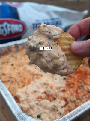 The viral pickle dip on the grill Recipe: -Fill a foil tray with these ingredients: 1 full jar of pickles chopped 2 chopped jalapeño peppers 8 oz shredded cheddar cheese 8 oz shredded Monterey Jack cheese 1 bunch chopped green onions 1 cup sour cream 1 cup greek yogurt 1 cup whipped cream cheese 1 packet ranch seasoning 1 cup chopped bacon 1 tbsp hot sauce 1 tsp cajun seasoning 1 tsp garlic powder 1 tbsp pickle juice -Place it on the grill indirect at 350F for 30 minutes. -When everything gets soft, mix it all together, then let it cook for 15 more minutes. -Remove, top with more cajun seasoning, and enjoy with kettle chips.