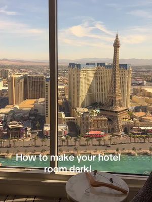 Hotel tips & tricks.  How to keep light from leaking through your shades.  Use a coat hangar.  #hoteltips #hacks 