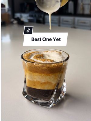Part 5 of testing the most viral shaken espresso drinks on the internet — and this might be the best one yet. Today’s drink: Cream Top Shaken Espresso. RECIPE: 2 oz espresso 1 tbsp brown sugar Tiny pinch of salt Ice Cream Top: 2 oz heavy cream ½ oz maple syrup or vanilla syrup Tiny pinch salt HOW TO MAKE: Shake espresso, brown sugar, salt,  and ice until chilled and foamy.  Pour over fresh ice. In a separate cup, lightly shake heavy cream, syrup,  and salt until slightly thickened but still pourable.  Slowly layer the cream over the espresso to create that smooth floating cream top. That foamy cream layer is the goal. Full recipe in the caption. Follow for the final part of the viral shaken espresso series. #shakenespresso #creamtopcoffee #icedcoffeerecipe #homebarista #viralcoffeedrink