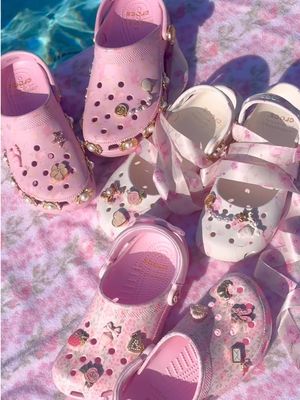 Our LoveShackFancy x Crocs collab launches March 5th🩷 The iconic @Crocs silhouette, like you’ve never seen them before!! Collect them. Stack them. Style them. Obsess.🤭💕🎀 #crocs #loveshackfancy #loveshackfancycrocs #shoes #loveshackfancycollab 