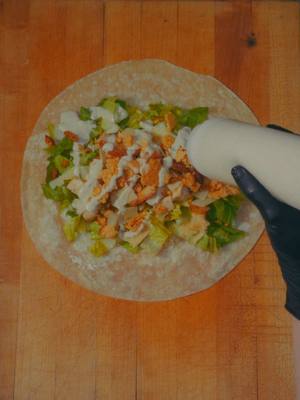 a classic, now going handheld 🥬 our classic chicken ceasar wrap now available at select locations la, ny, and midwest