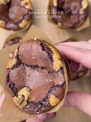 Irresistible chocolate lava Brookie cups🤤 crinkled top, crispy corners and gooey center, exactly how it should be 💯 🤎 Ingredients FOR BROWNIES: •170g butter  •250g white sugar  •100g light brown sugar  •3 eggs at room temp •70g melted dark chocolate  •65g cocoa powder  •1 tsp vanilla extract  •1/2 tsp salt  •90g All purpose flour  FOR COOKIES: •115g cold chopped unsalted butter •80g caster sugar •80g light brown sugar •225g chocolate chunks or chips •238g plain flour  •½ tsp salt •1½ tsp baking powder •¼ tsp baking soda •1 egg + egg yolk  •½ tsp vanilla INSTRUCTIONS For brownie batter: •Melt butter over medium-low heat, stirring every 10–15 seconds. It will foam, turn golden and smell nutty (5–7 mins). Remove from heat immediately once brown bits form. Add chocolate and cocoa powder to hot butter Mix until completely smooth and lump-free. Let it cool slightly (warm, not hot). •Whisk eggs and sugar well. Whisk until sugar is mostly dissolved.✨This step gives the shiny, crinkly top. •Add brown butter chocolate mixture + vanilla. Mix smooth. Add dry ingredients, Add flour and salt. Mix just until combined. Do not overmix. For cookie batter: •Cream cold butter + sugars. Whisk until slightly creamy and fluffy.Add egg, egg yolk and vanilla. Mix until fully incorporated. •Add dry ingredients. Flour, baking powder, baking soda & salt. Mix gently until just combined. No overmixing. Fold in chocolate chips •Chill dough 30–60 mins for better flavor & texture. Assemble: •Line your muffin tray with cupcake liners. Add a layer of rich brownie batter, then spoon over some cookie dough. Press in a few chocolate chunks (I used Galaxy Minis) Top with another layer of brownie batter and finish with small dollops of cookie dough on top to create that beautiful, classic brookie look. •To bake preheat the oven (fan oven) at 170C and then bake for 25-30 minutes or until the edges are done and top is still little soft. Let it set at room temperature for 30-40 minutes before serving. •Enjoy✨ #cookie #brownies #chocolate #fyp #explorepage✨ 