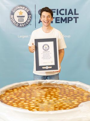 Today I made the World’s Largest Serving of Matzah Ball Soup with some help from @ChatGPT! Weighing in at 1,356 pounds this matzo ball soup was verified by @Guinness World Records as the biggest ever made! It took me and my team of 8 chefs over 13 hours to pull this off. Some crazy numbers to share are that the soup was made with 120 chickens, 850 hand-rolled matzo balls, 300 carrots, 250 bunches of herbs, just to name a few. I couldn’t have done it without ChatGPT helping me at every step of the process! I used ChatGPT to scale up my family’s recipe to a huge 200 gallon version, to find what kind and where to purchase the right vessel to use as my “bowl” to hold giant soup, locate the largest pots available for purchase on the market, and even to find a professional weight measurement company for the video shoot in the New York area. I have no idea how I would have pulled this off without Chat on my team. Once the final weight of the soup was called, my team and I labeled it all into containers to donate all the soup to @cityharvestnyc to feed thousands of New Yorkers in need. #ChatGPTPartner