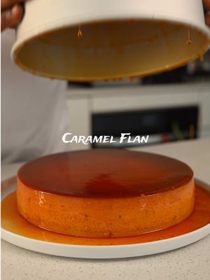 Caramel flan is one of those desserts that proves simple ingredients can create something incredible. Silky, rich custard baked gently in a water bath and finished with a deep amber caramel that melts into the sauce once it’s unmolded. Smooth, lightly spiced with cinnamon, and perfect served cold. 🍮 Ingredients ½ cup sugar (for caramel) 12 eggs 500 ml evaporated milk 500 ml sweetened condensed milk 250 g cream cheese 1 tbsp vanilla extract 1 tsp cinnamon Method 	1.	Preheat oven to 325°F / 160°C. 	2.	Melt the sugar in a saucepan over medium heat until it turns a deep amber caramel. Immediately pour into the bottom of your baking dish or mold and let it set. 	3.	In a blender, combine eggs, evaporated milk, sweetened condensed milk, cream cheese, vanilla, and cinnamon. Blend until completely smooth. 	4.	Pour the custard mixture over the hardened caramel. 	5.	Cover tightly with foil and place the dish in a larger roasting pan. Fill the pan with hot water until it reaches about halfway up the sides of the flan dish. 	6.	Bake for 1 hour 10 minutes to 1 hour 20 minutes, depending on how hot your water bath is, until the custard is just set. 	7.	Let cool, then refrigerate until completely chilled. 	8.	Run a knife around the edge and invert onto a plate to release the caramel. #caramelflan #flannapolitano #EasyRecipes #torontochef 