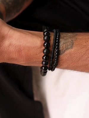 The Midnight bracelet is inspired by the allure of city nightlife. Each piece is handmade using globally-sourced natural stones, so no two pieces are alike. Featuring polished and matte onyx, each piece is fully adjustable for the perfect fit and constructed using wax-coated nylon for ultimate durability.