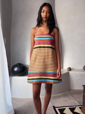 Road trips, beach days, our Strappy Linen Mini Dress — they all go well together. 