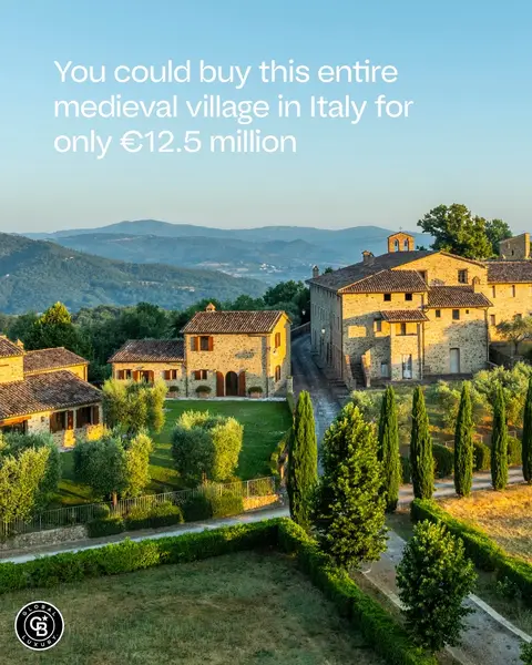 A 9th-century medieval village in Umbria’s rolling hills sits on seven hectares of fenced parkland between Tuscany and the Tiber Valley. The borgo includes 19 residential units totaling 4,200 square meters, seven completed with high-quality finishes and private pools, while 12 remain in advanced raw state ready for custom interiors. The property spans over 30 hectares with 1,200 productive olive trees, three hectares of vineyards, walnut groves and truffle grounds. Two artificial lakes and multiple wells provide irrigation. A historic church from 1126 anchors the village center, while modern amenities include a 20kW photovoltaic system and wood chip heating. Five minutes from main services, accessible through three independent entrances. Shared amenities include an infinity pool, hot tub, tennis court and walking paths through cultivated fields and ancient woods. Anti-seismic restoration techniques preserve medieval architecture while ensuring structural integrity. ▪️ Comunaglia, Umbertide, Perugia, Italy ▪️ €12,500,000 | 45 BD | 50 BA | 48,437 SQ FT ▪️ Listing by Valentino Ronsisvalle | Coldwell Banker Best Properties