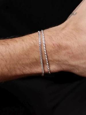 The Silver Cuban Rope Bracelet stack features two of our best selling chain bracelets combined for the perfect look. Each piece is handmade by expert craftsmen in Tuscany, Italy. They’re waterproof & sweatproof and feature a fully custom logo tag and clasp design that you won’t find anywhere else.