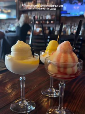 Finally trying the viral soft serve margaritas anddddd we didn’t really like them 😩 They just started with these so give them some time to get back in the lab yall.  📍Barrel and Bones 12300 Innwood Rd Dallas TX 75244 (only at the Dallas location) #softservemargarita #dallastx #100thingsindallas #dallasrestaurants #dallasbars 