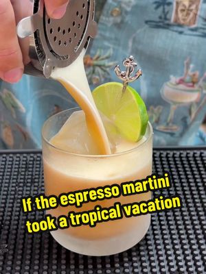 Espresso Rum-Tiki 🗿☕️🍹  If you love espresso martinis and tropical vibes, this is the cocktail for you. Coffee is a tropical growing plant and it pairs wonderfully with other tropical flavors. I created this cocktail with some of my favorite tiki flavors, almond orgeat for that rich nutty flavor, falernum for some spice and sweetness, along with a blend of rums for a balanced flavor profile. Happy national espresso martini day! If you try this cocktail let me know!  Espresso Rum-Tiki 1oz cold brew concentrate (or espresso) ☕️  1oz aged rum: Isle of Fiji 🇫🇯  1oz white rum: White ‘Stache 👴🏼 1/2oz almond orgeat  @Liber & Co. 🍯  1/2oz falernum 🇧🇧  1 dash bitters 🇹🇹 Combine all ingredients in a shaker filled with ice. Shake hard to foam the coffee. Strain over ice and garnish with a lime slice. Tiki shirt from @Reyn Spooner  #nationalespressomartiniday #espressomartini #rum #coffeecocktail #tikicocktail 