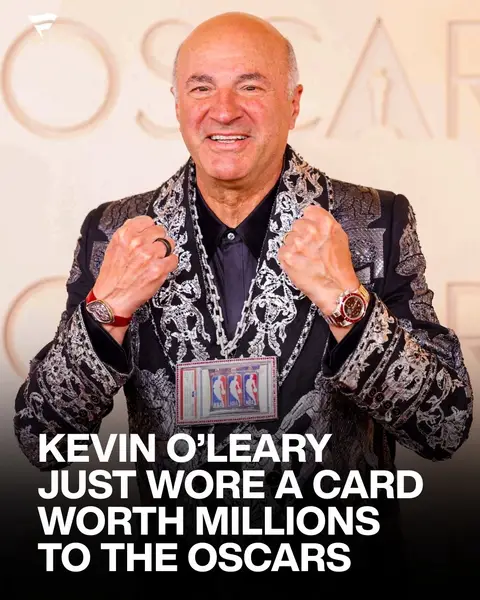 Kevin O’Leary just pulled up to the Oscars with one of the rarest basketball cards in the world. A 1-of-1 card that features Logoman patches taken from game-worn jerseys of Michael Jordan, Kobe Bryant, and LeBron James. For the red carpet, Tiffany & Co. transformed the card into a bespoke chain crafted with white gold, diamonds, and perfectly matched rubies.