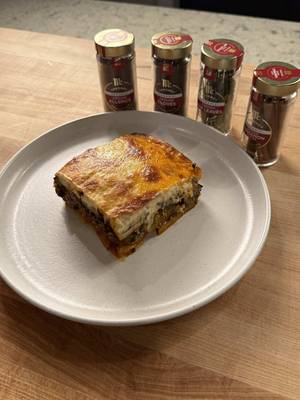#McCormickGourmetPartner mousaka! Explore the possibilities with  @mccormickgourmet's finest 70+ flavors at mccormick.com/gourmet  @McCormick Gourmet #McCormick Ingredients: Lamb Ragu 2 Tbsp high quality olive oil 2 lb high fat ground lamb 1 medium yellow onion, diced 2 small shallots, thinly sliced 4 cloves garlic, minced 3 Tbsp tomato paste 1 McCormick Gourmet Saigon cinnamon stick 2 McCormick Gourmet Turkish bay leaves ½ tsp McCormick Gourmet dried thyme 1 tsp  McCormick Gourmet dried oregano ¼ tsp McCormick Gourmet ground cloves 1 tsp McCormick Gourmet ground allspice ¾ cup red wine 14 oz tomato passata ½ cup beef stock McCormick salt & pepper Vegetable layer 3-4 eggplants, sliced, ¾  inch rounds 3-4 yukon potatoes, peeled and ½  inch rounds McCormick Salt 6 Tbsp olive oil  Béchamel 6 Tbsp unsalted butter 6 Tbsp all purpose flour 3 ½ cups whole milk 1 ½  cup pecorino or parmigiano, grated (plus more for on top) ¼ tsp McCormick Gourmet ground nutmeg 2 egg yolks   Recipe Work on the vegetables. Add the sliced eggplant and potatoes to a large sheet tray lined with a wire rack. Season with kosher salt on both sides and let sit for about 1 hour so the salt can draw out the moisture then pat the vegetables very dry with a paper towel.  While your vegetables are curing, make your ragu. Set a large dutch oven over medium high, once hot add the olive oil then add the lamb in batches. Make sure to not overcrowd the pan. Don't stir for a couple of minutes, you want to get some good browning here. Season with salt & pepper, mix and cook for 3-5 more minutes until the lamb is browned and fully cooked. You want to let the moisture cook out so the lamb can fry in its own fat.  Remove from the pot and repeat with the rest of your lamb.    Turn the heat to medium and add a little more oil if needed then add the onions, shallots and garlic. Season with salt. Saute for 3-4 minutes until softened.  Next return the seared lamb to the pot along with tomato paste, cinnamon, bay leaves, oregano, thyme, ground cloves and ground allspice. Cook for 2-3 minutes, stirring often until fragrant. Next add the red wine and cook for 2 minutes until most of the liquid is gone. Add the tomato passata and beef stock. Season to taste with salt & pepper, bring to a bubble, reduce to a simmer, cover with a lid and cook for 35-40 minutes or until needed.  Set a large non-stick or stainless steel pan over medium high heat.   Once hot, working in batches, add a drizzle of oil  and fry your vegetables for about 2-3 minutes per side until browned and a bit charred but not over cooked. Return the fried vegetables to the sheet pan to cool. Next make the béchamel, set a medium pot over medium low, add the butter and once melted add the flour. Cook, stirring very often for 2-3 minutes until the raw flour has cooked out, but it is not browned.  Next, gradually add the milk while mixing until the sauce has thickened. Turn off the heat and add the grated pecorino, nutmeg and egg yolks. Season to taste with salt & pepper, cover with a lid and set aside. Preheat the oven to 350°F.  Assembly. In a deep 9x13 baking dish start by adding a layer of potatoes then a layer of eggplant. It's ok if they overlap a little. Remove the bay leaves and cinnamon stick from the sauce, add your sauce into the dish. Smooth it out, add another layer of eggplant followed by your béchamel. Spread it out evenly and cover with a very generous layer of additional grated pecorino.   Place the baking dish on a sheet tray and bake for 40-50 minutes until beautifully browned on top. Remove from the oven and let cool for 25-30 minutes.  Slice and serve. Enjoy!