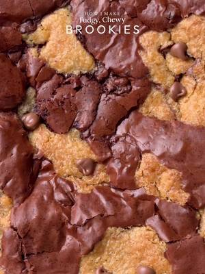 Brookies🤤 Ingredients: FOR BROWNIE • 170g butter •250g white sugar •100g light brown sugar •3 eggs at room temp •70g milk or dark chocolate •65g cocoa powder •1 tsp vanilla extract •1/2 tsp salt •90g All purpose flour FOR COOKIE  •115g cold chopped unsalted butter •80g caster sugar •80g light brown sugar •200g chocolate chunks or chips( you can increase or reduce this according to your preference)  •238g plain flour  •½ tsp salt •1½ tsp baking powder •¼ tsp baking soda •1 whole egg + 1 egg yolk  •½ tsp vanilla INSTRUCTIONS: FOR BROWNIE: •Melt the butter in a small saucepan over medium-low heat, stirring and scraping the pan every 10-15 seconds. The butter will melt, foam, then turn golden brown with nutty aroma and small brown bits (about 5-7 minutes). Remove from heat and add cocoa powder and milk or dark chocolate bar in hot butter.Mix thoroughly till there're no lumps in it and set it aside to cool. ••In a bowl add eggs, white sugar, light brown sugar, whisk together until most or all of the sugar granules have dissolved. *This step is essential for achieving that shiny, crinkly top.* •Once the sugar has dissolved, add the brown butter, cocoa powder, melted dark or milk chocolate mixture and vanilla extract. Mix everything together. •Add the all-purpose flour and salt and mix just until combined, avoid overmixing. FOR COOKIE: •In a large mixing bowl, add the cold cubed butter and whisk until slightly creamy. Add the white sugar and light brown sugar, then whisk together until well combined and fluffy. •Add the eggs, vanilla extract, and chocolate chips or chunks. Whisk until fully incorporated. •Add the flour, baking powder, baking soda, and salt. Gently mix until just combined, do not overmix. ASSEMBLE: •Preheat the oven at 166C if you're using dark colour aluminum pan or at 176C if using lighter colour aluminum pan. •Line a square 8 inch baking tin with parchment paper, leaving overhang for easy removal. Lightly grease the paper. •﻿First brownie layer. Pour about ½ to ⅔ of the brownie batter into the pan. Spread evenly to form the base. •Drop large chunks of cookie dough randomly over the brownie batter.Keep them uneven this gives pockets of gooey cookie after baking. •Final brownie layer. Gently spoon the remaining brownie batter over the fillings. Finish with More large chunks of cookie dough. •Bake for 1 hour or it depends on pan size and depth How to check doneness •Edges: set and slightly pulled from the pan •Center: soft and slightly tender when hot **TIPS** •I used the full brownie batter along with approximately 250g of cookie dough (I had some extra cookie dough left, which I baked separately as cookies). The total baking time in an 8-inch pan was about 1 hour and 20 minutes.This will give thick and big bars. •Or you can use only half brownie batter, this will result in medium sized bars and baking time will also reduce. •After the first 30 minutes of baking, cover the pan with aluminum foil and continue baking. This helps prevent the top layer from overbrowning. •Once baked, while it’s still warm, sprinkle chocolate chips on top for that extra indulgent, scrumptious finish. •For neat cuts let it cool completely for about 2 hours. •Enjoy!  #brookie #cookie #brownies #fyp #explorepage✨ 