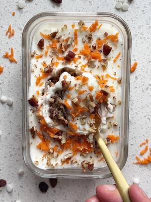 Carrot cake overnight oats - because with this warmer weather it feels like Spring is springinnnn 🌸  I FRIGGEN LOVE carrot cake. Especially with cream cheese icing. So I made a healthier oats version so I can eat it every danggggg day for breakfast. INGREDIENTS - FOR OATS 1/2 cup certified gluten free rolled oats 1/2 cup almond milk 1 tsp chia seeds 1/2 scoop vanilla protein powder (as always @1UpNutrition Vanilla Ice Cream protein powder - code BAILS for up to 40% off everything) 1/4 tsp cinnamon 1/8 tsp nutmeg 2 tbsp shredded carrots 1 tbsp pecans, chopped 1 tbsp raisins FOR CREAM CHEESE WHITE CHOCOLATE GANACHE 1/3 cup greek yogurt 2 tbsp white chocolate chips 1.5 tbsp cream cheese DIRECTIONS - 1) Add all oat ingredients to a bowl or jar. Stir well and refrigerate for a minimum of 1 hour. 2) Microwave white chocolate in 30-second increments in a small bowl. Mix in with Greek yogurt and room temperature cream cheese. I used a whisk to get rid of lumps. 3) Remove oats from the refrigerator, and pour cream cheese ganache overtop. Put back in the fridge overnight to set. 4) In the morning, top with more carrot shreds and pecan pieces! Grab and go! https://basicswithbails.com/course/breakfast/carrot-cake-overnight-oats/ 🥕🥕 #proteinoats #proteinbreakfast #highproteinbreakfast #carrotcakeoats #glutenfreebreakfast