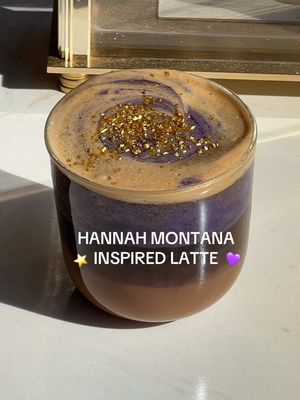 who else is ready for the hannah montana 20 year anniversary special?! 💛🥹💜 catch me sipping on this cutie hm inspired ube latte! ⭐️ recipe: 〰️double shot espresso 〰️ice 〰️splash of milk 〰️ube cold foam 〰️& ofc sprinkles!! #homecafe #hannahmontana #ubelatte #coffeerecipe 