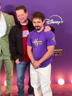 Moisés Arias and Jason Earles pose together at the world premiere of the “#HannahMontana 20th Anniversary Special.” #HannahMontana20